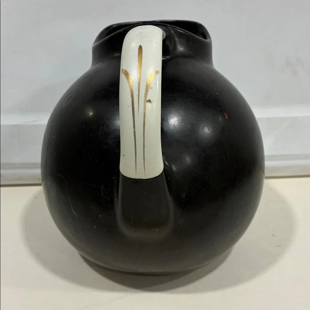 Hall’s Superior Quality Kitchenware Pitcher W/ Gold and White Handle Black Body